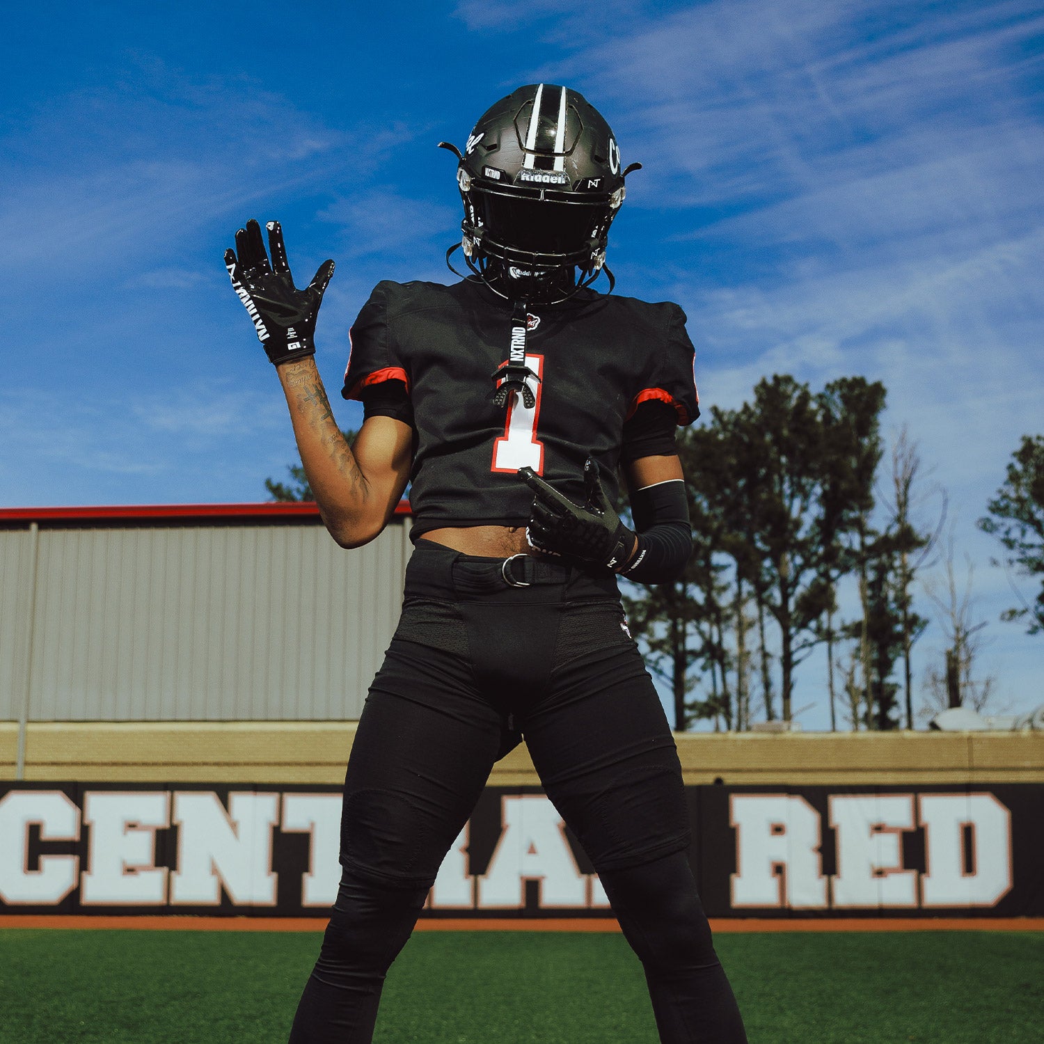 High School Football Player Wearing NXTRND G1 Pro Football Gloves Black and TWO Mouthguard Black