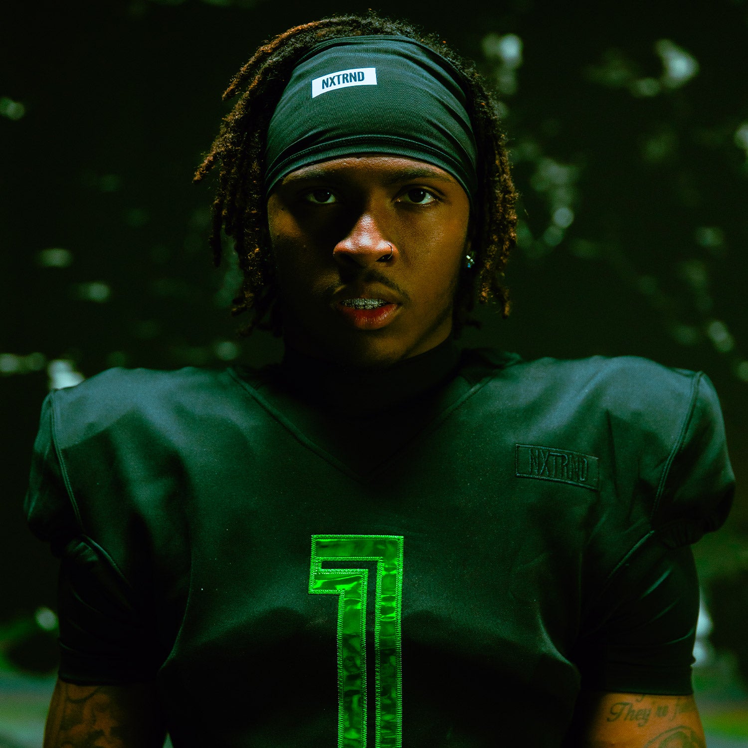 NCAA Wide Receiver Dakorien Moore Wearing NXTRND Sports Athletic Headband Football Skull Wrap Black