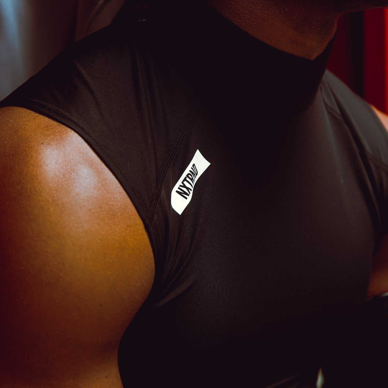 Caleb Downs Wearing Core Sleeveless Compression Mock Neck Black Close Up
