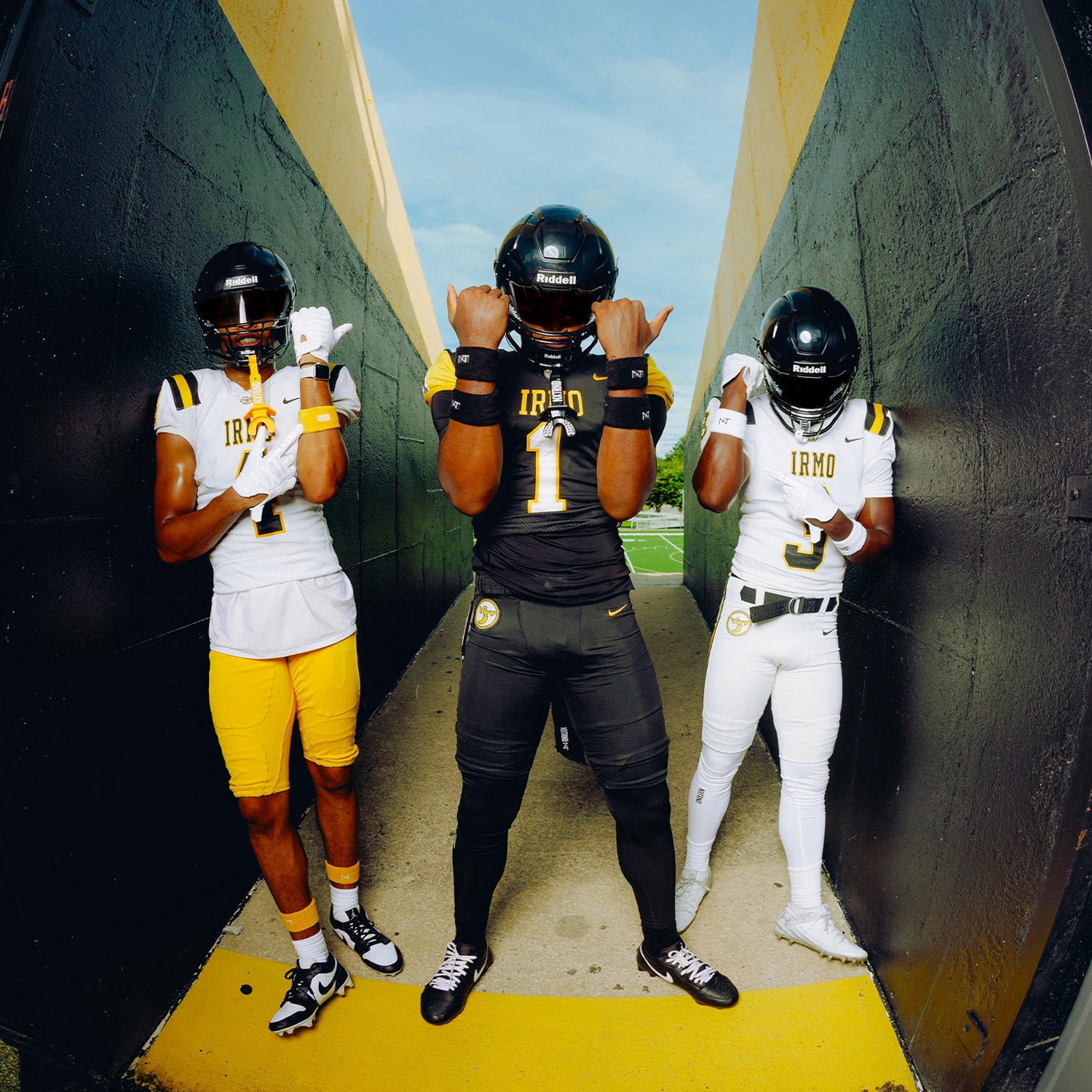 Group of High School Football Players Wearing NXTRND Football Gear and Accessories