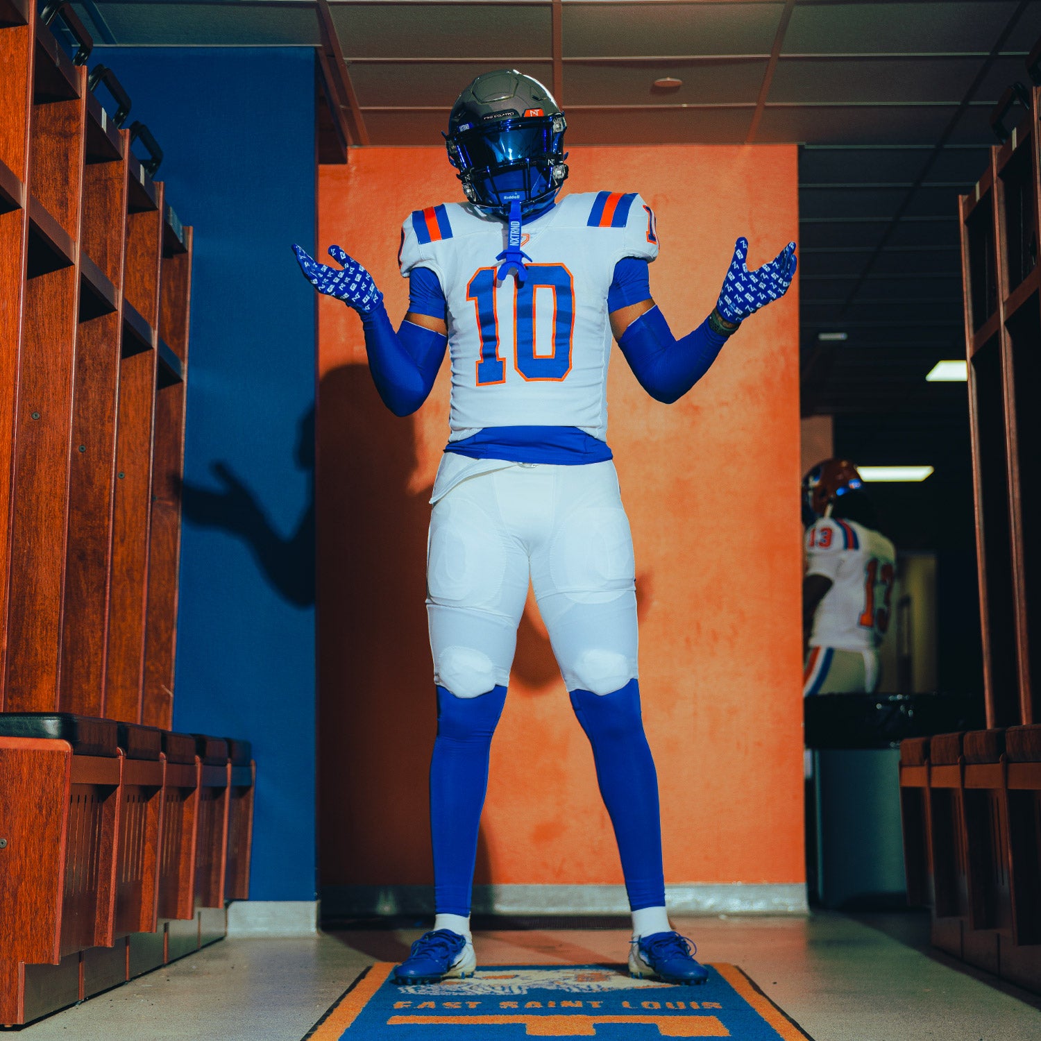 High School Football Locker Room Player Wearing Core Tights Compression Pants Blue