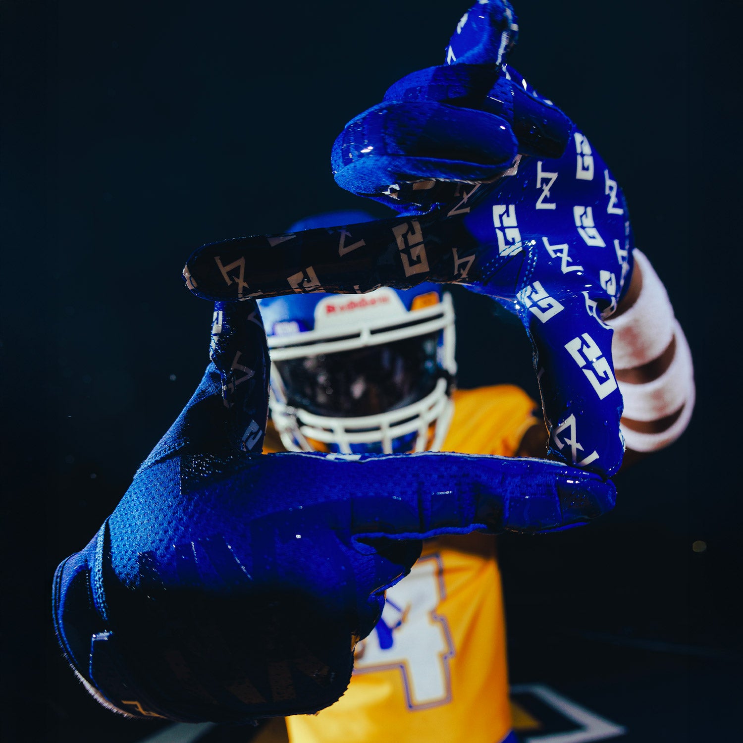 High School Football Player Wearing NXTRND G2 Pro Football Gloves Blue and VZR3 Football Visor Black