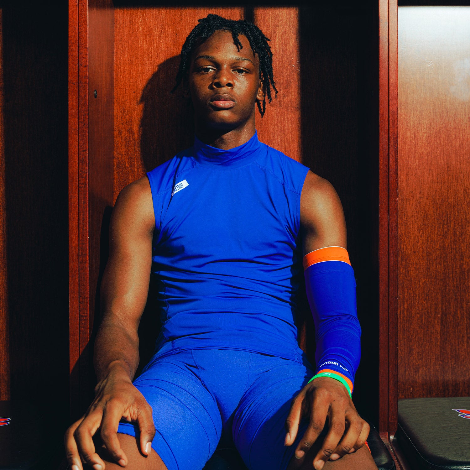 Football Athlete Wearing Core Sleeveless Compression Mock Neck Blue