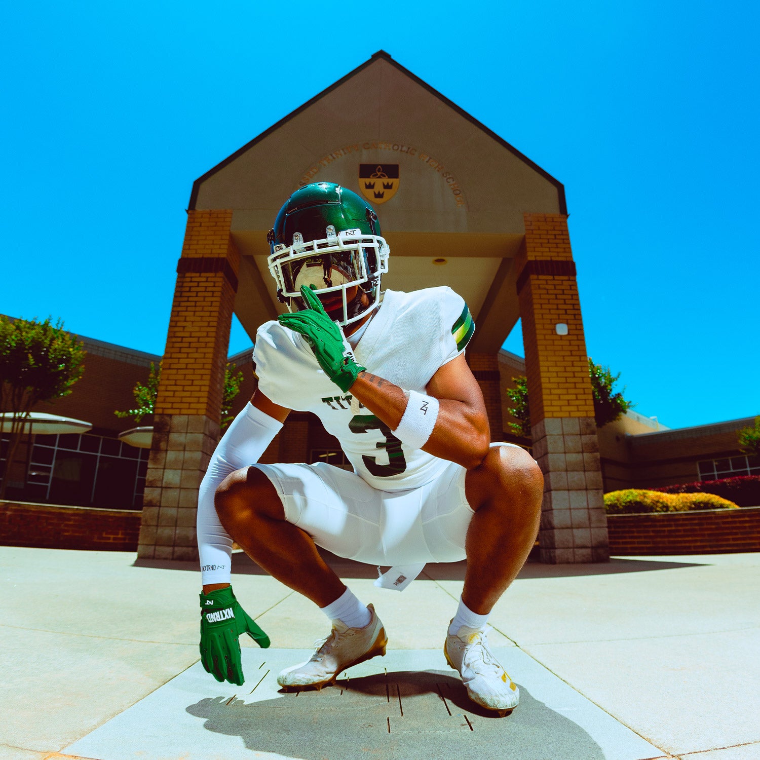 High School Football Player Wearing NXTRND G3 Pro Padded Football Gloves Dark Green and VZR3 Football Visor Mirror