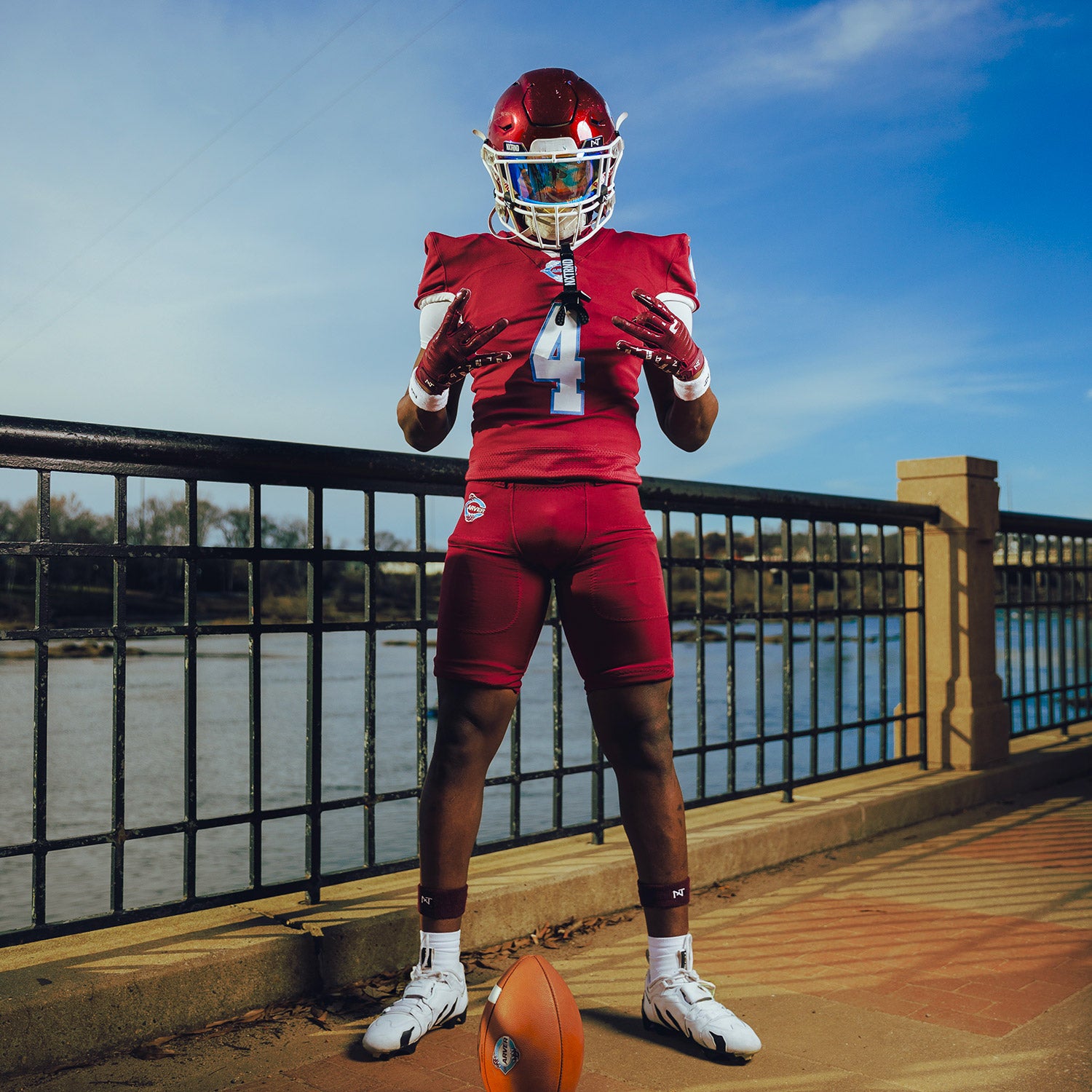 High School Football Player Wearing NXTRND G2 Pro Football Gloves Maroon and VZR3 Football Visor Blue