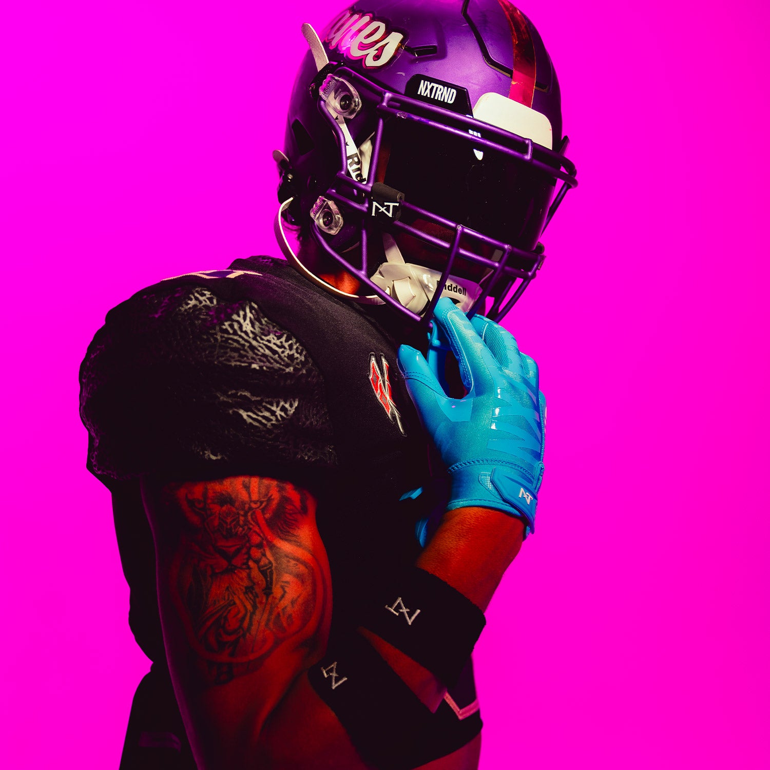 High School Football Athlete Wearing NXTRND G1 Pro Football Gloves Neon Blue and VZR3 Football Visor Black