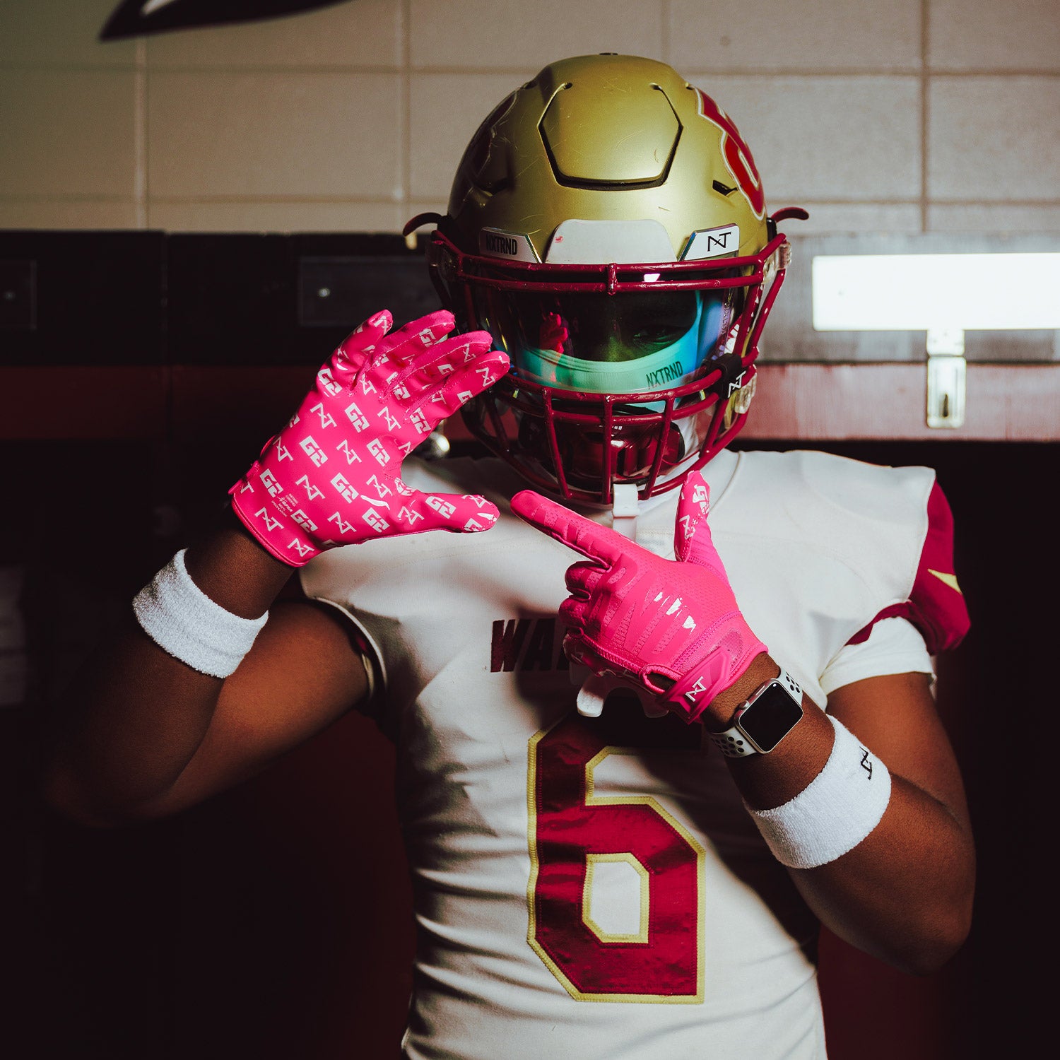 High School Football Player NXTRND G2 Pro Football Gloves Pink and Ski Mask White