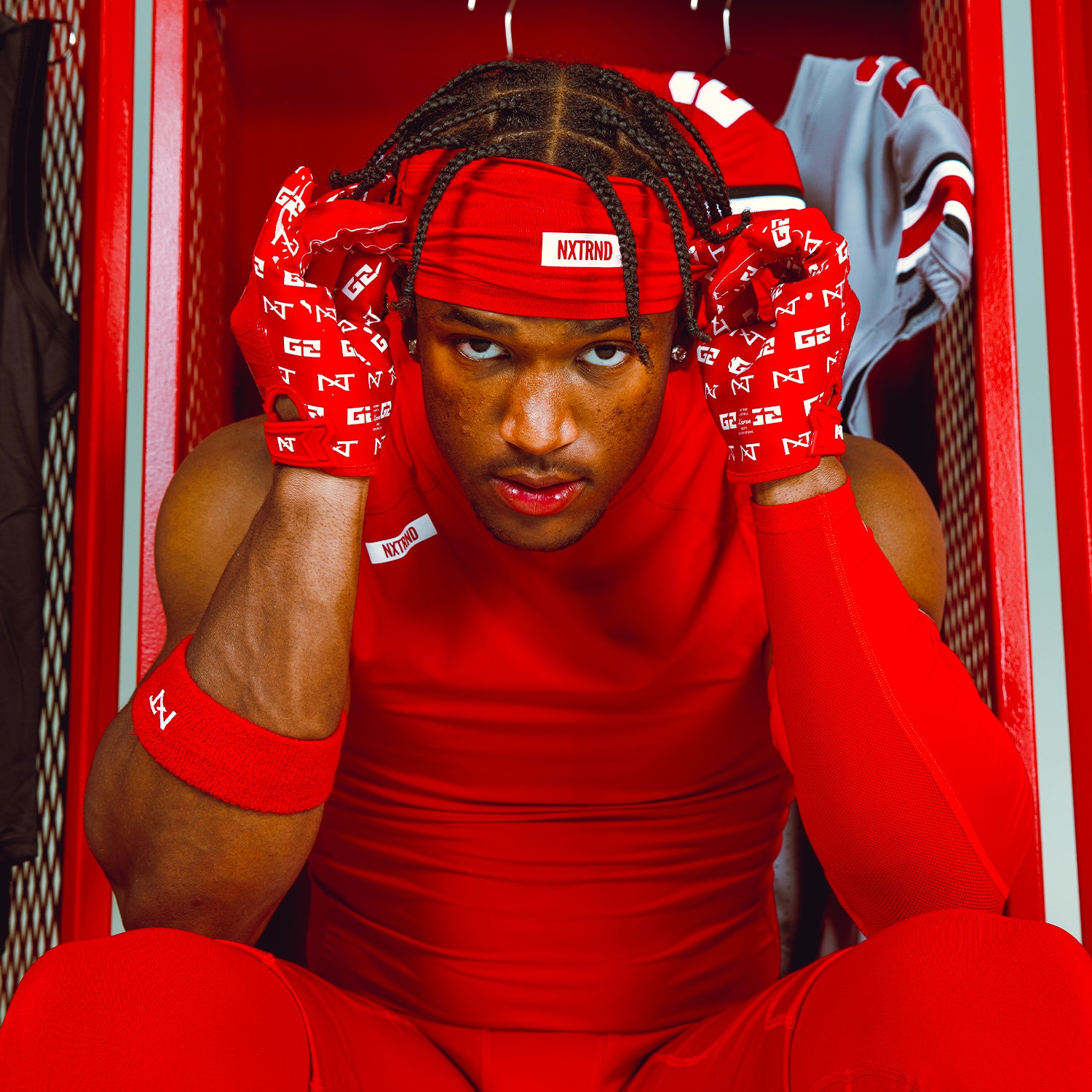 NCAA Star Caleb Downs Wearing NXTRND G2 Football Gloves and Sports Athletic Headband Football Skull Wrap In Red