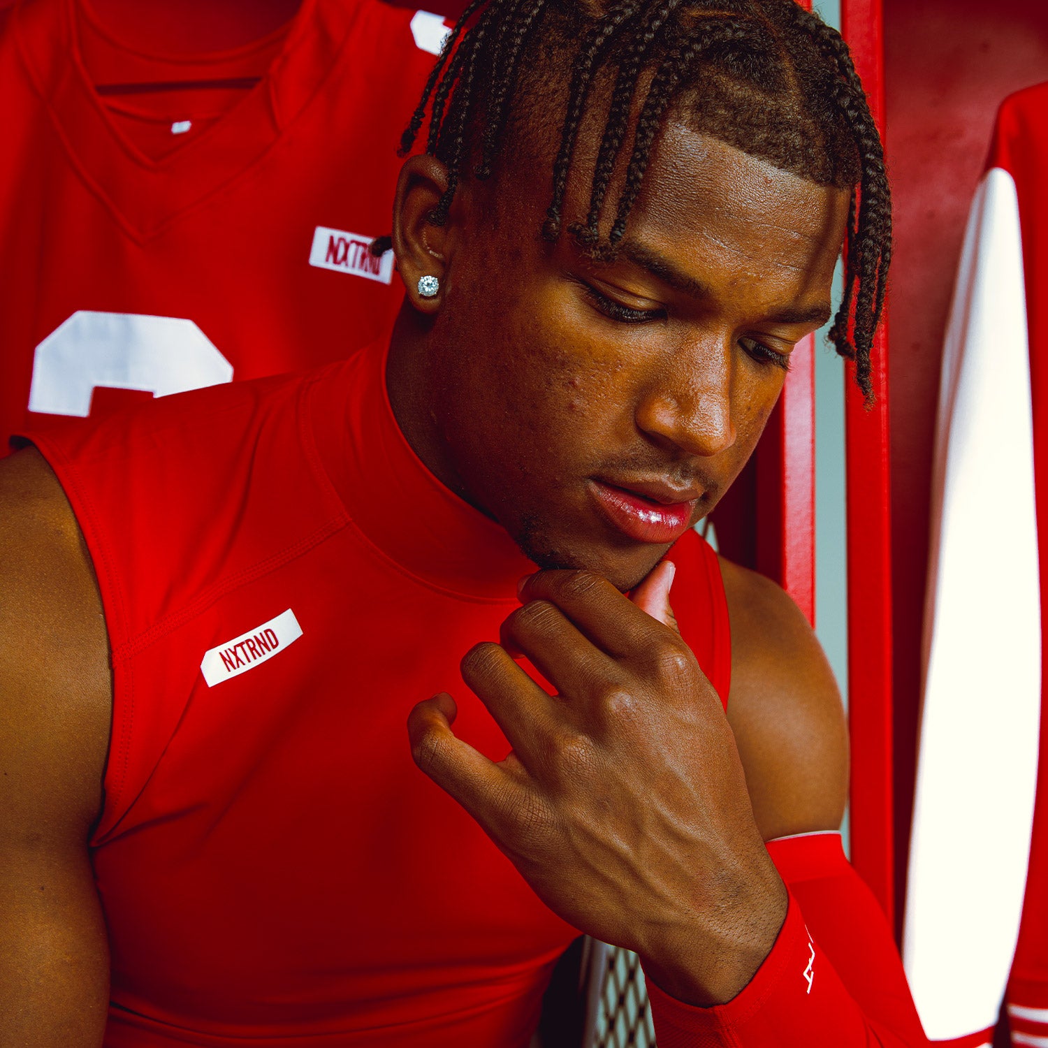 Caleb Downs Wearing Core Sleeveless Compression Mock Neck Red