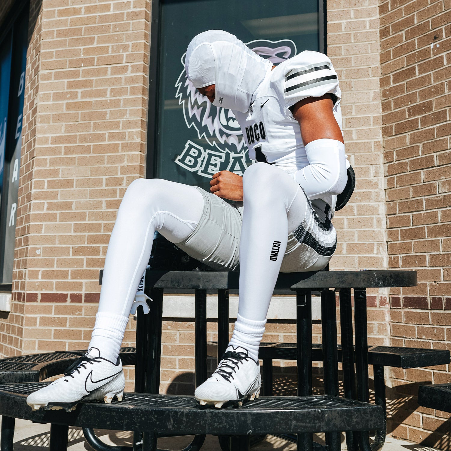 High School Football Player Wearing Nxtrnd Core Tights Compression Legging Pants White and Ski Mask White