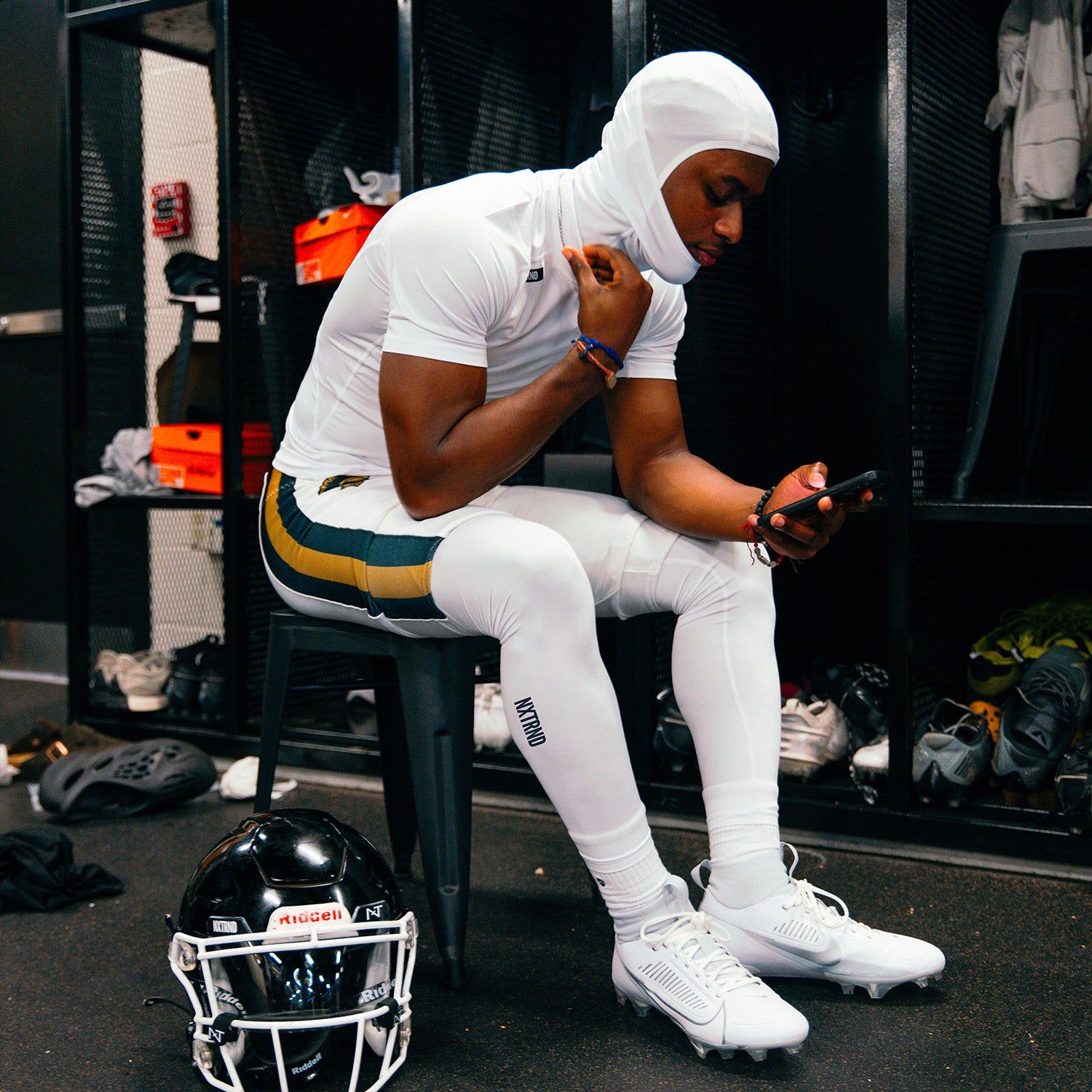 High School Football Player Wearing Nxtrnd Core Compression Short Sleeve Shirt White and Ski Mask White