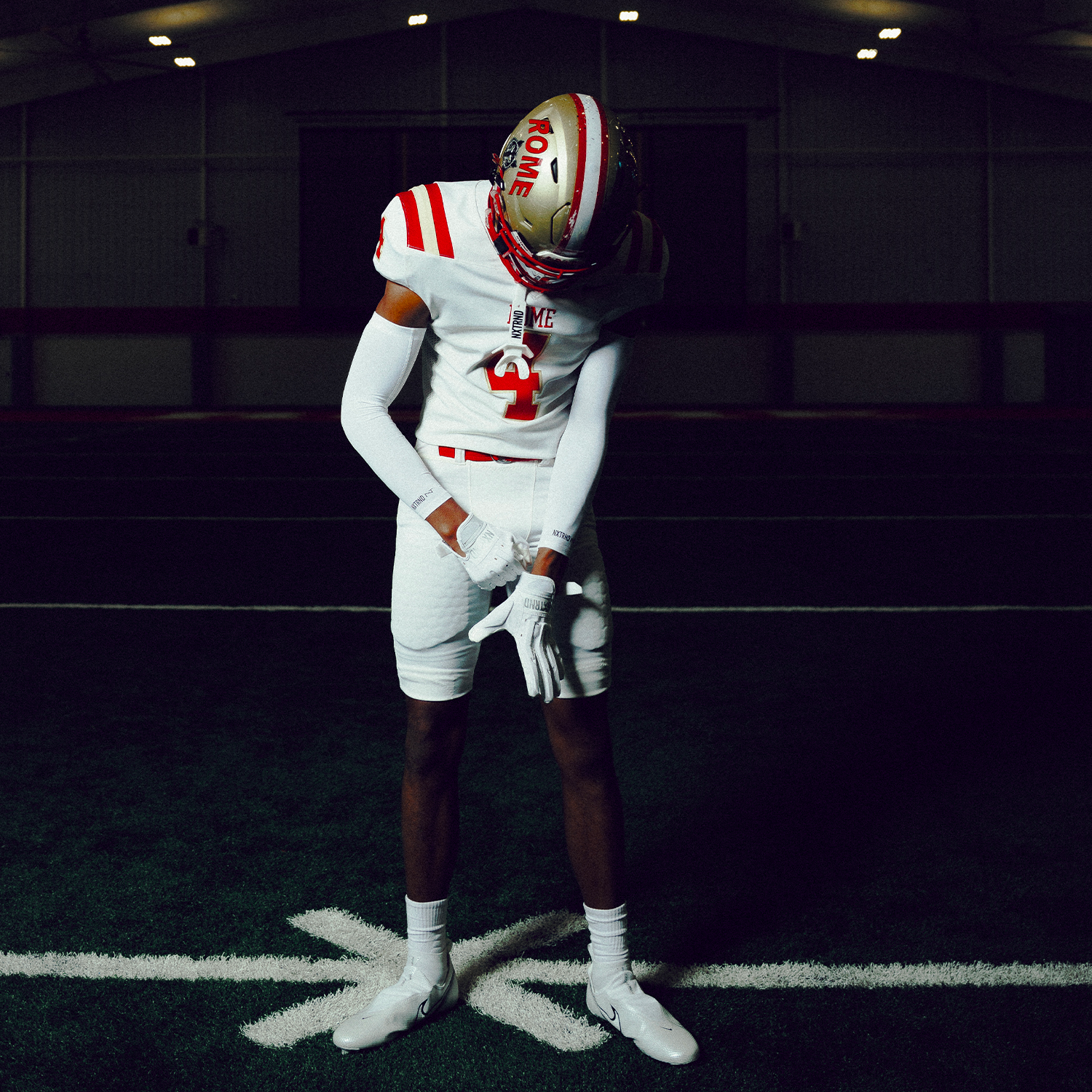 High School Football Player on Field NXTRND G3 Pro Padded Football Gloves White and TWO Mouthguard White