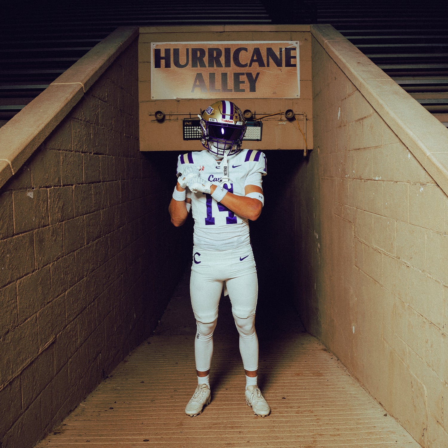 High School Football Player Wearing NXTRND Wrist Band White and Core Compression Pants White