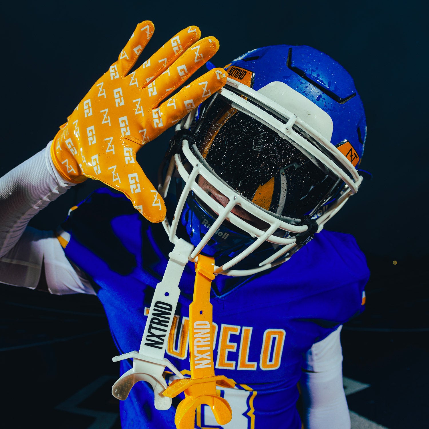 High School Football Player Wearing NXTRND G2 Pro Football Gloves Yellow, VZR3 Football Visor Black and Double TWO Mouthguards