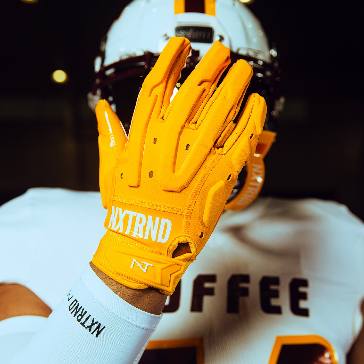 High School Football Player Wearing NXTRND G3 Pro Padded Football Gloves Yellow Close Up