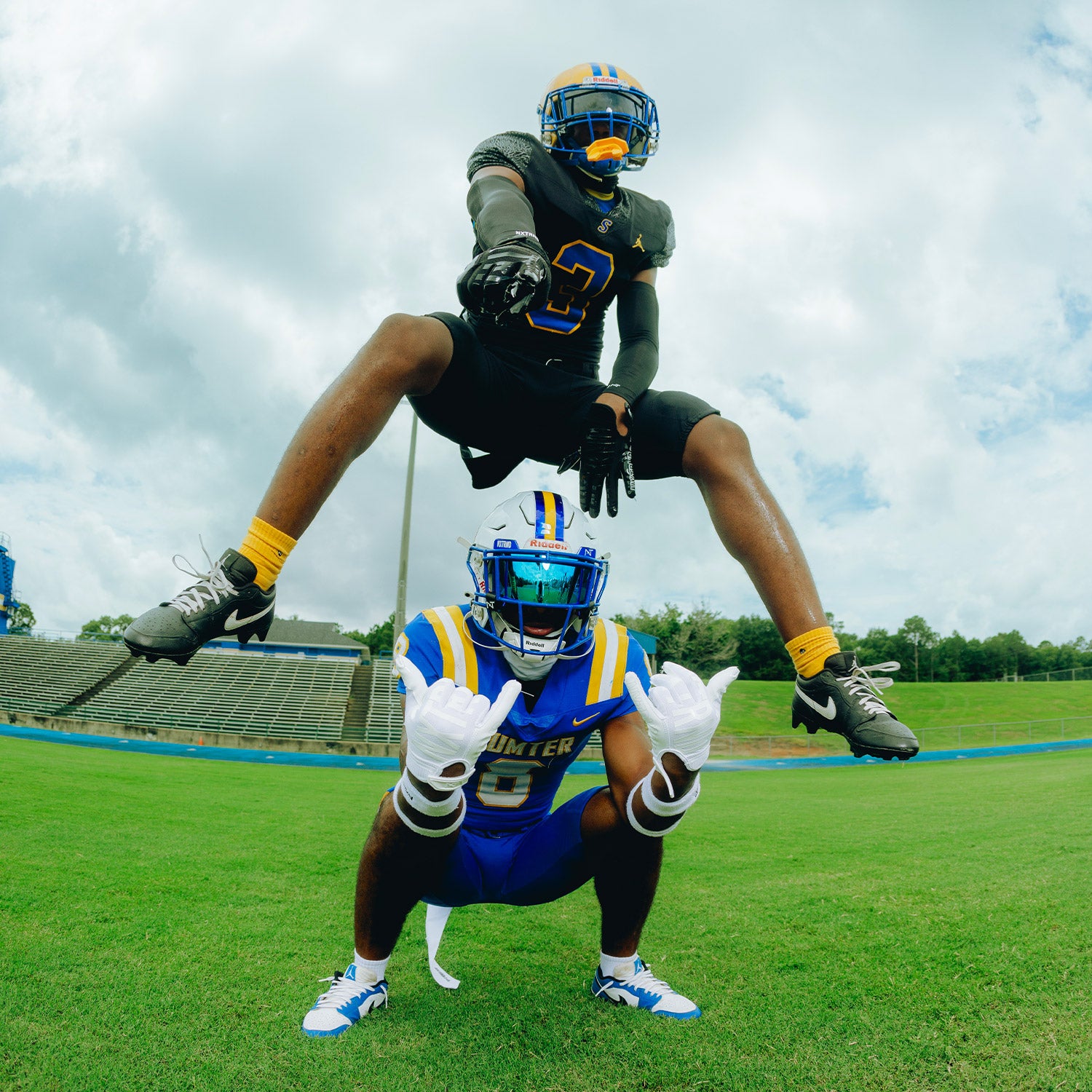 High School Football Player Wearing NXTRND Crew Mid Cut Padded Socks Yellow and Compression Arm Sleeves Black