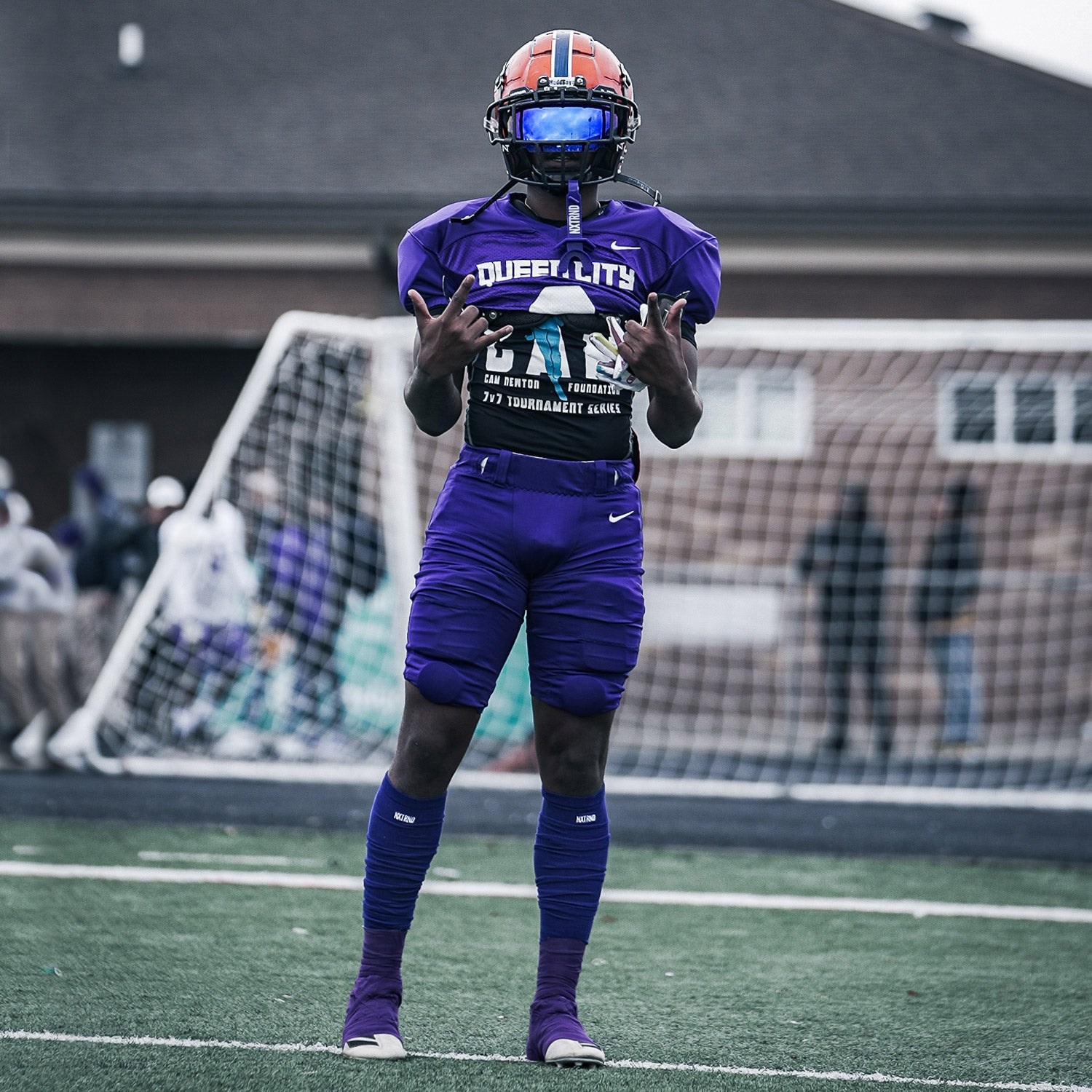 Purple football spats outlet