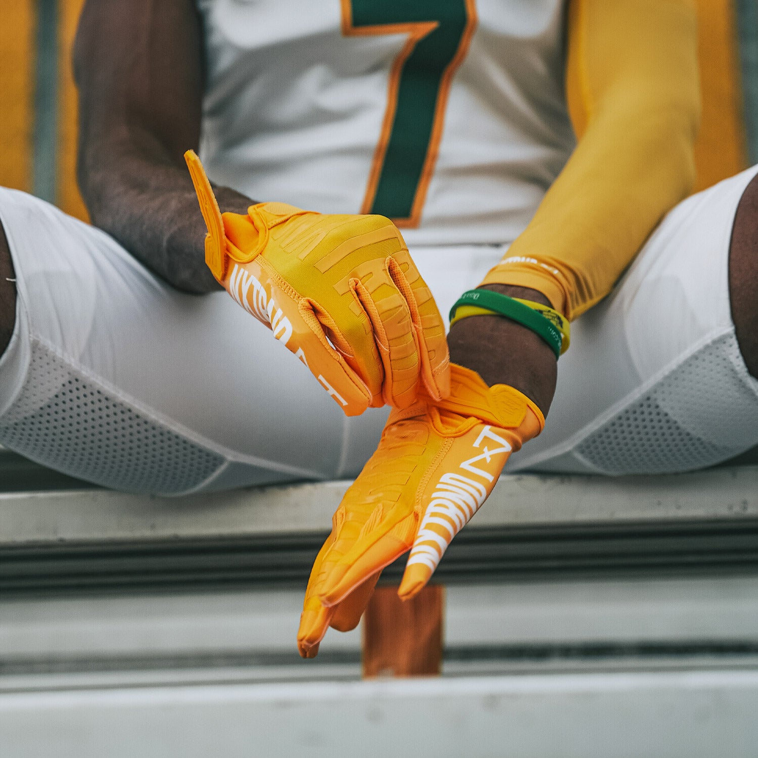 Black and yellow youth football gloves on sale